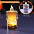 Piccola candela LED di Halloween con luce gialla calda e motivo zucca e croce - Zucca