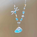 Detail of multi-layer beaded necklace featuring white bow, natural shell and blue stones - Style 8-Blue-White (Bowknot Shell Beaded)