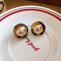 Macro detail of leopard resin earrings with hammered gold metal inside a ceramic dish - Gold Brown-Hammered Round Ball (52#)