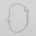 Silver bracelet with hollow round pendant featuring letter D on white background - Silver D