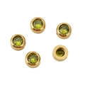 Detailed view of 6mm golden stainless steel beads inlaid with green faceted gemstones - 6mm (10 Pieces Pack) / Grass Green Zircon