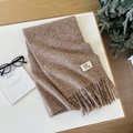 Brown wool knit scarf with tassels and brand label on a cozy winter lifestyle setting - 45 Root Brown / Over 175cm