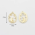 Detailed view of gold alloy star and moon charms with rhinestones and 27x18mm measurements - Moon & Star
