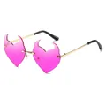 Pink heart-shaped rimless devil sunglasses with gold metal arms and pointed horn design - Deep Purple