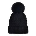 Close-up of black cable-knit beanie featuring a fluffy pompom and thick ribbed cuff - Black