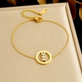 Gold-plated stainless steel chain bracelet featuring a round pendant with three inlaid stones - Gold Round Sliding Diamond Pendant Style(B1918)