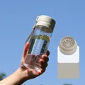 Beige 600ML portable sports cup with flower tea filter and sky background view - 600ml / Transparent Gray