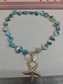 Seaside shell and starfish necklace with turquoise beads and gold pearl charms - Blue Shell Conch Starfish Pearl Beaded Necklace