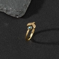 Detailed view of gold fishtail ring with white zircon and blue enamel evil eye element - D-Fish Tail Evil Eye