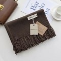 Detail of dark brown cashmere scarf with fringe, brand label, and gift tag set - Coffee / 200cm