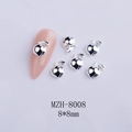 3D silver peach nail charms 8x8mm size displayed on pink nails and gray background - Relief 3D Peach Style (MZH-8008) / 50 Pieces / Silver