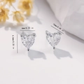 Detailed macro view showing the precise dimensions of pink heart zircon stud earrings - EH728 Clear Heart Studs