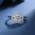 Silver ring with round brilliant cut center stone and clover shaped halo on blue surface - Four-leaf Clover [1 Carat] Ljz-18 / Adjustable Open