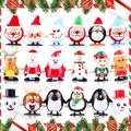 Colorful 18-piece Christmas wind-up toy set featuring Santa, reindeer, and penguin characters - Christmas Wind Up 18pcs Set C