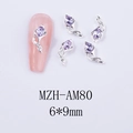 Dettaglio del ciondolo per unghie a fiore d'argento 6x9mm con strass marquise viola - Base Argento Strass Viola (AM80)