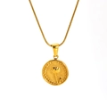 Golden tulip coin necklace with textured relief pendant and sleek snake chain - June Water Lily