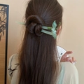 Classic green faux jade hair pin with leaf and bead details worn on hair bun - 14# Hair Stick-Green (Faux Jade Flower)