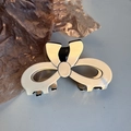 Detail of cream acetate bow claw clip with black trim and elegant french style - 8.5cm / Beige with Bow