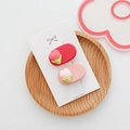 Detail of red and light pink tulip floral hair clips on a card display - D-017 Tulip Pair