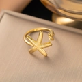 Adjustable gold starfish ring with textured nautical elements for summer beach vacation - Starfish Ring