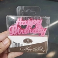Pink Happy Birthday alphabet candles in clear retail packaging for cake decoration - Pink