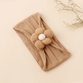 Detail of baby nylon headband featuring a large 3D fabric flower and wavy knit texture - Large 3D Padded Flower Style / Dark Camel (3)