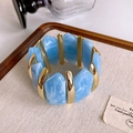Elastic cuff bracelet with sky blue marble resin blocks and polished gold metal spacers - Gold Sky Blue Marble Resin