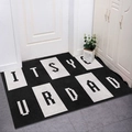 Modern minimalist black and white rectangular door mat featuring ITS YOUR DAD pixel art text - Letter Splicing