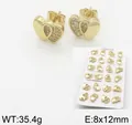 Golden double heart stud earrings with sparkling cubic zirconia on a copper base - Heart Shape