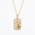 Golden Leo zodiac necklace with a lion relief and pink enamel inlay with white crystals - Leo