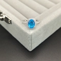 Classic 925 sterling silver ring featuring a blue oval gemstone with diamond accents - Size 5 / Blue Glass/Spinel