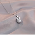 Elegant rotating rabbit pendant necklace in silver with sparkling zircon and white enamel - Rabbit Necklace (X1423) / Steel