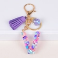 Letter V resin keychain with colorful stones, purple tassel, and golden hardware finish - Letter V(5859543255626)