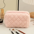 Detailed view of pink plush pencil case with quilted texture and smooth zipper closure - 18*10*10cm / Pink