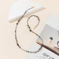 Detail of eyewear chain with blue beads, grey stones, and golden lobster clasps - Light Gray
