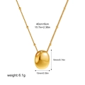 Detailed macro view showing the precise dimensions of this gold oval pendant necklace - Gold Bean