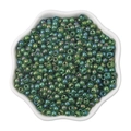 Rainbow green 4mm glass seed beads for DIY jewelry in a white petal ceramic bowl - 4mm / Iridescent Emerald Green (#12 Style)