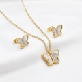 Elegant gold butterfly jewelry set including necklace and stud earrings on white silk background - White
