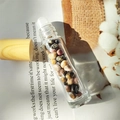 Natural crystal stone roller bottle with wooden cap for essential oils and perfumes - Rhodonite