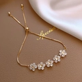Adjustable gold star flower bracelet featuring sparkling zircon and a box chain design - Gypsophila Star Bracelet-Gold