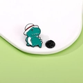 Spilla dinosauro in smalto verde con cappellino bianco e chiusura a farfalla nera - T-Rex Teal