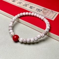 Star Moon Bodhi prayer beads with red agate and gold accents on vintage background - Faux Cinnabar 6x7mm Bracelet