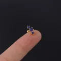 Minimalist gold plated earring featuring three deep blue round zircons on fingertips - Three Stones Row (300-4#) / Dark Blue