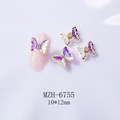Macro shot of 10x12mm aurora crystal rotating butterfly nail charm with rhinestone edges - 6755 Gold Base + AB Aurora + Rotating