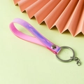 Laser holographic pink PVC wristband keychain with silver metal ring on green background - Holographic Deep Pink with Chain
