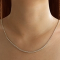 Primer plano de collar de cadena chapado en oro 18K con circonitas micro-engastadas - Collar Tennis de CZ Redonda de 3mm (C-031)