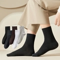 Neutral mid-calf crew socks in black, white, and grey with ribbed cuffs and soft knit texture - One Size / Solid Color Men's Socks