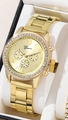 Elegant gold women's watch with rhinestone bezel and Geneva dial on a white display pillow - Gold 2 Single Watch