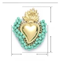 Detail view of heart pendant with mint green beads and golden stainless steel finish - Cyan Beaded Flame Heart