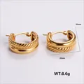 20mm gold double-layer hoop earrings with twist texture and smooth surface design - Amleh009